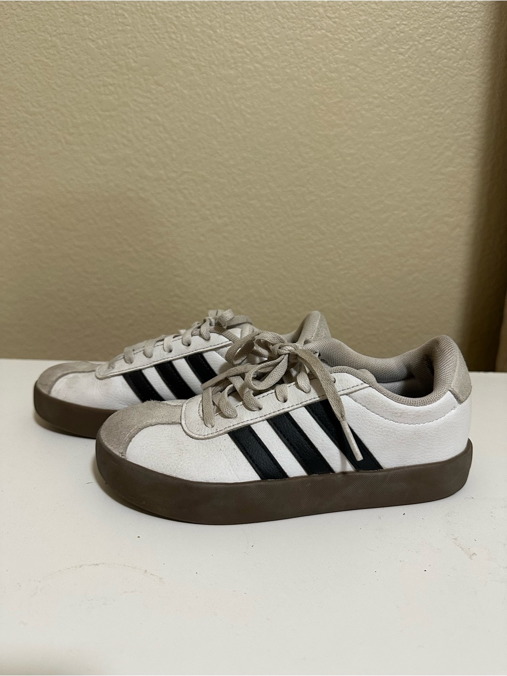 Adidas Boy’s White Sneakers with Black Stripes